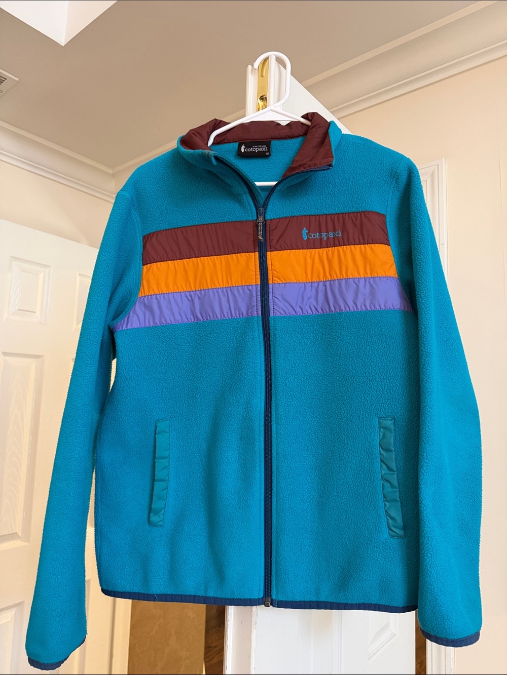 cotopaxi Teal Fleece Jacket with Maroon, Orange & Purple Stripes